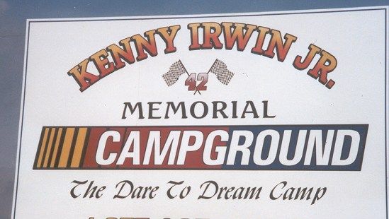 Sign reading Kenny Irwin Jr. Memorial Campground — The Dare to Dream Camp
